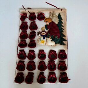 Fabric hand made Christmas wall advent count down calendar.